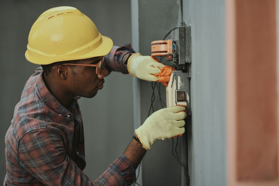 Technician servicing a home system